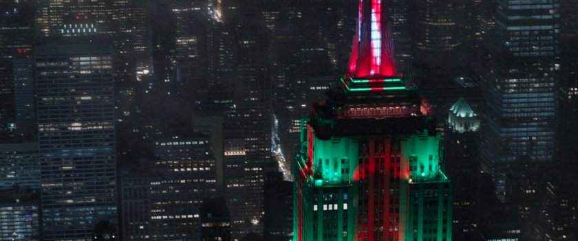 Nighttime aerial view of Empire State Building in New York City.