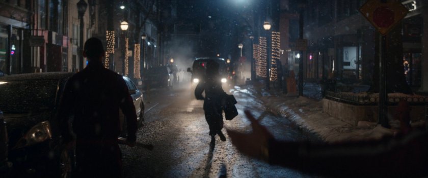Kate runs down New York street from a van heading towards her.