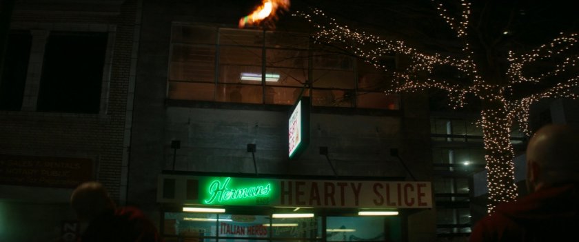 Molotov cocktails being thrown outside Herman's Hearty Slice.