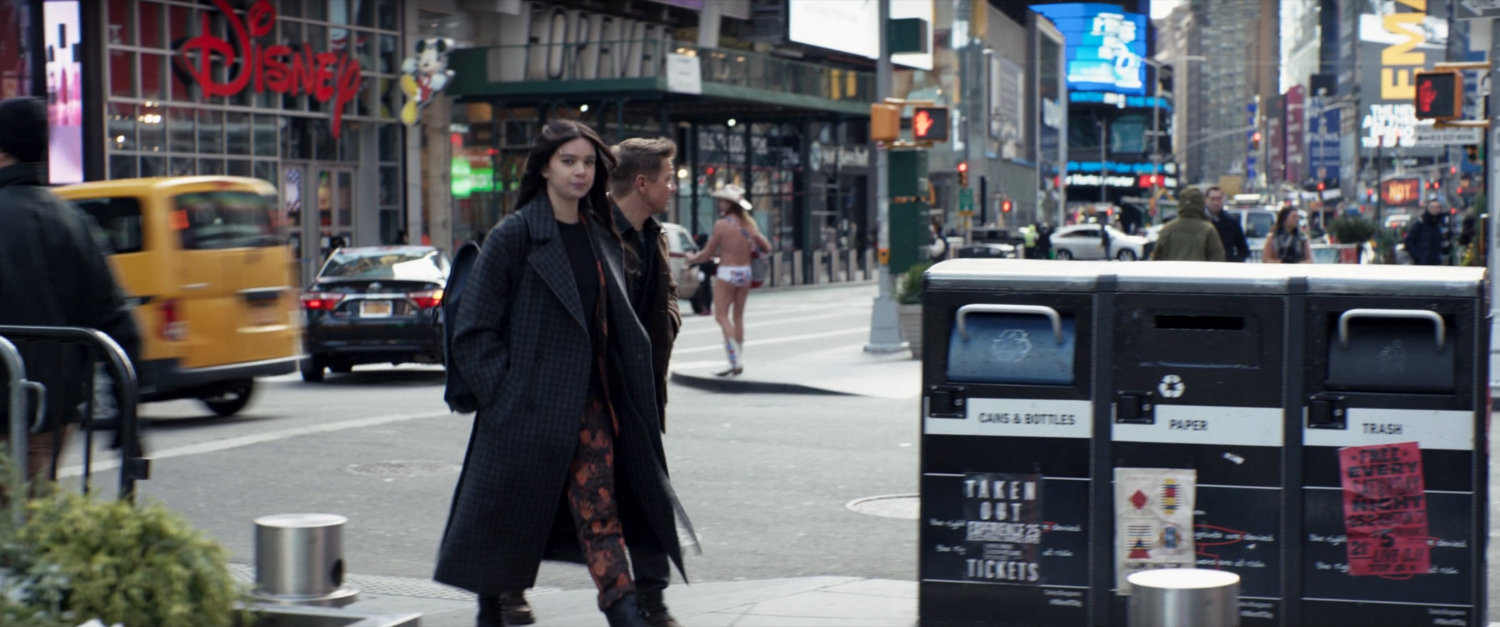 Clint and Kate walk through Times Square.