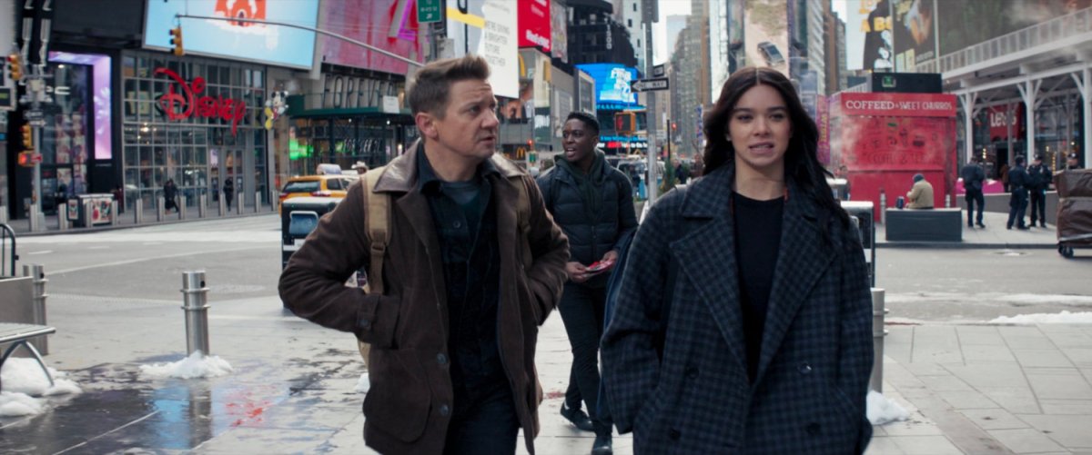 Clint and Kate walk through Times Square.