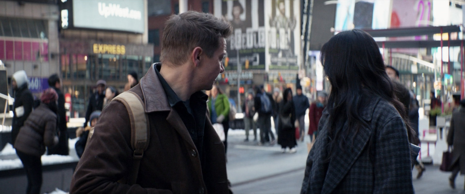 Clint and Kate walk through Times Square.