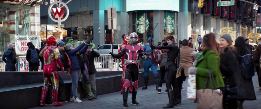 Actors posing as superheroes in Times Square.