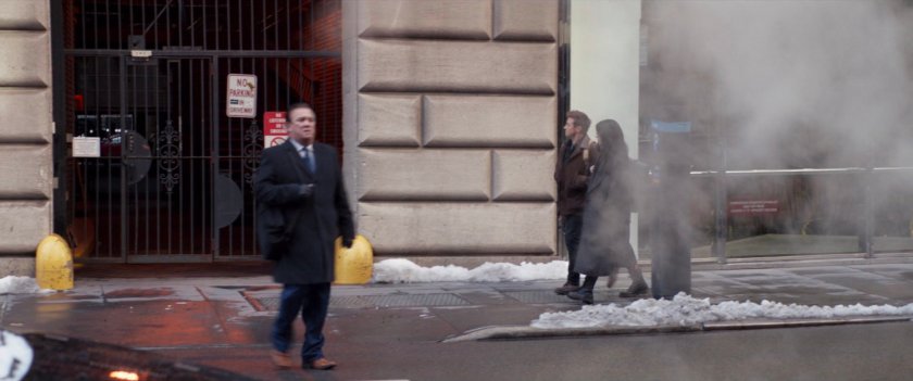 Clint and Kate on the sidewalk outside Bishop Security.