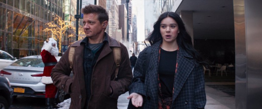 Clint and Kate on the sidewalk outside Bishop Security.