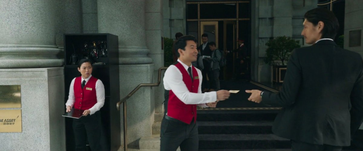 Katy and Shaun working as valets in front of the Fairmont San Francisco hotel.