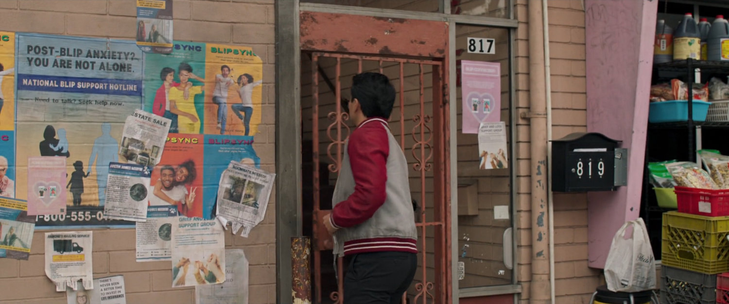 Shaun entering a San Francisco apartment building.