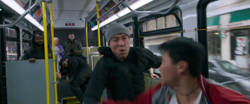 Shaun swings at a bad guy on a San Francisco metro bus.