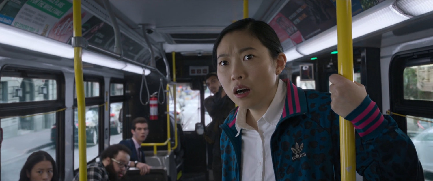 Katy looks shocked on a San Francisco metro bus.