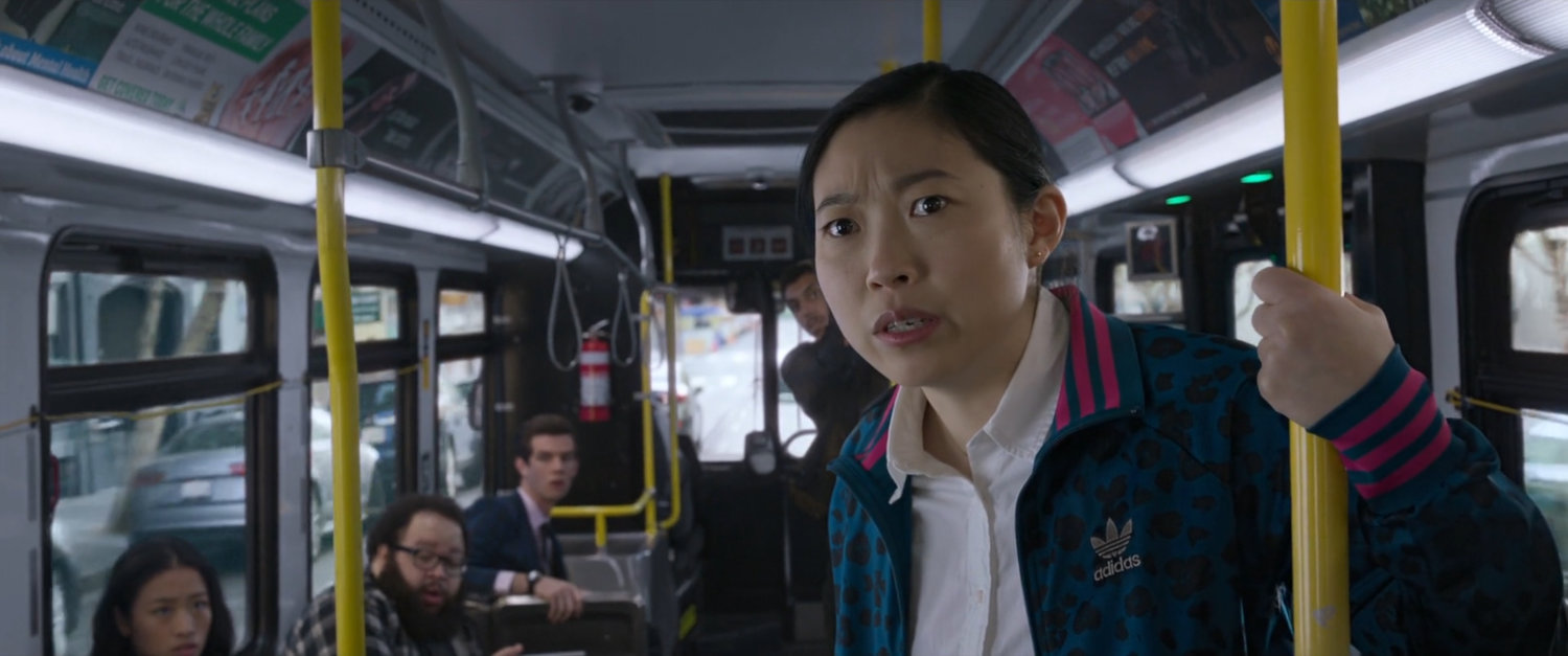 Katy looks shocked on a San Francisco metro bus.