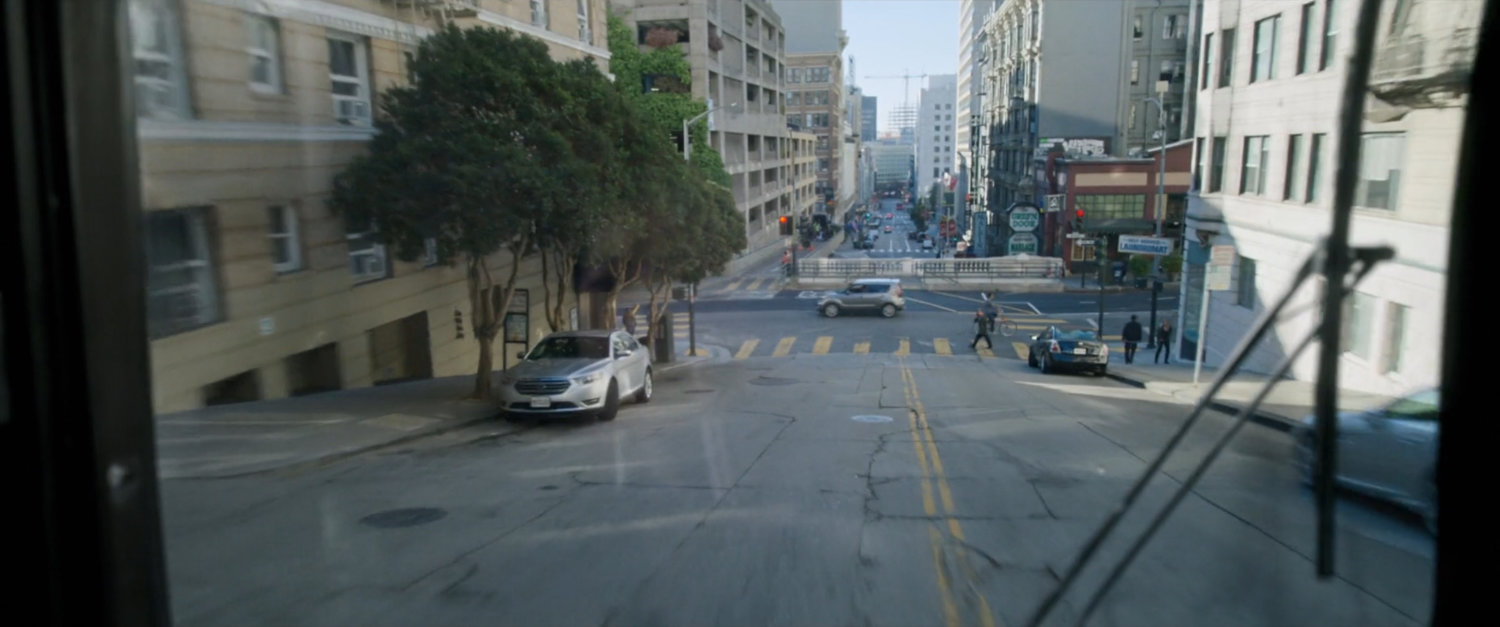 POV from San Francisco metro bus at upcoming intersection.