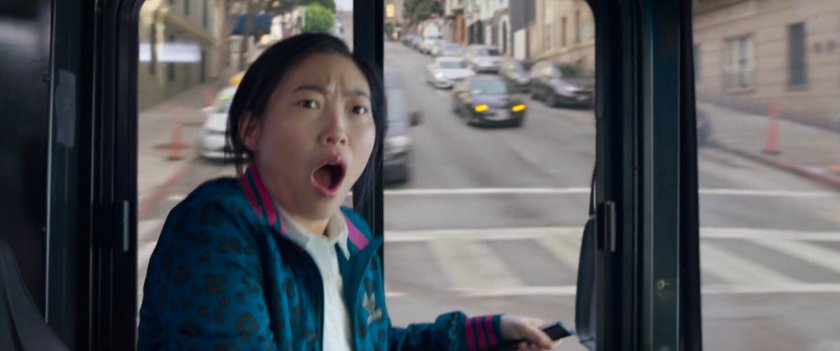 Katy reacting surprised while driving a San Francisco metro bus.
