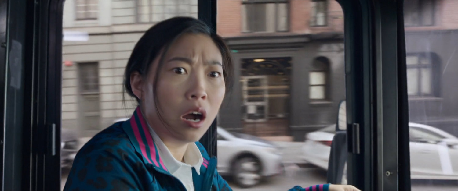 Katy looking shocked while driving a San Francisco metro bus.