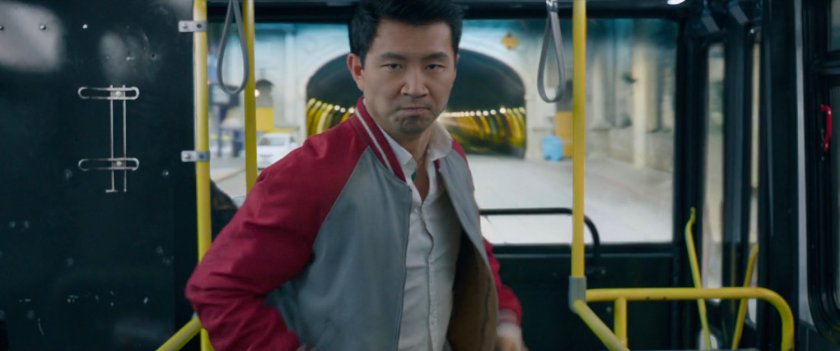 Shaun strikes a pose near the entrance of a San Francisco metro bus.