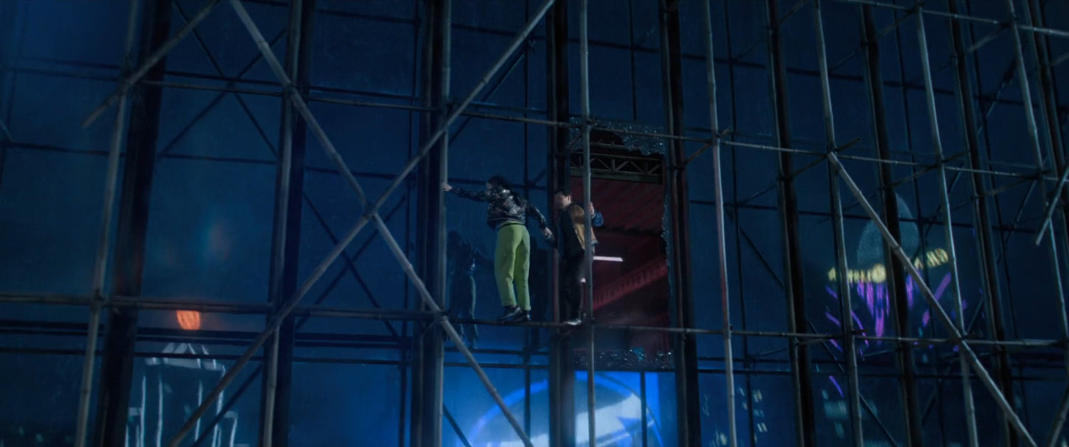 Shaun and Katy on skyscraper scaffolding in Macau.