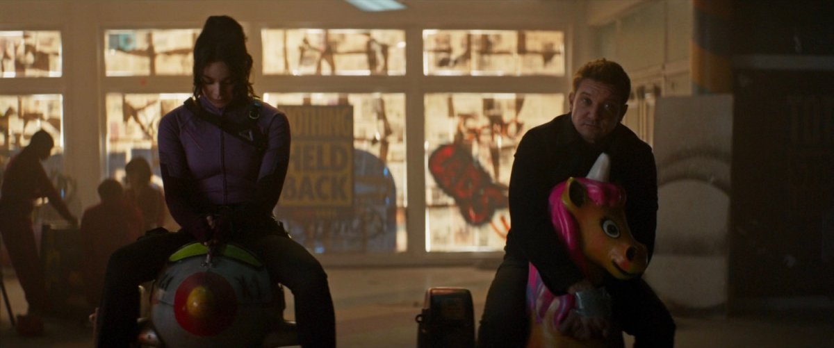 Clint and Kate captured in an abandoned toy store.