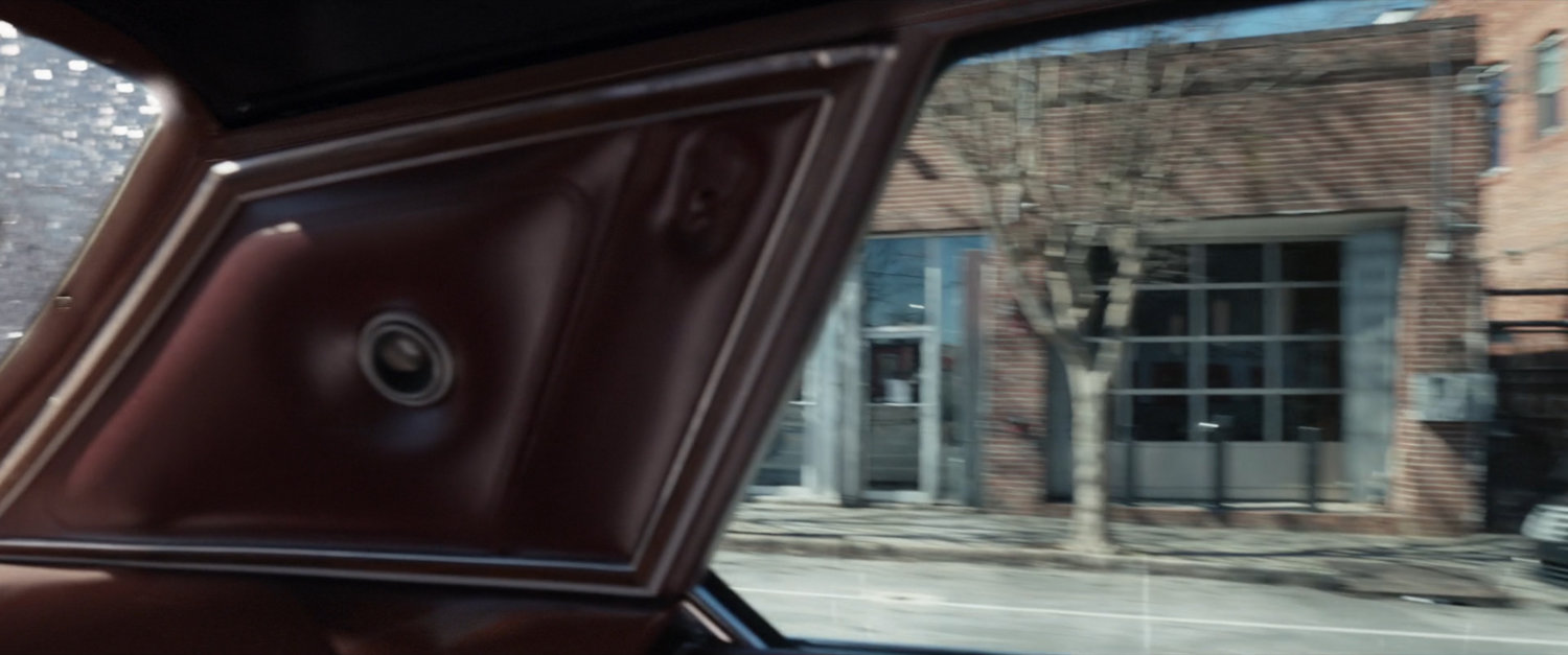 View of car chase from inside car.
