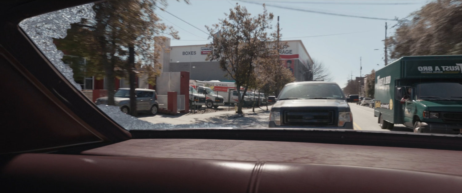 View of car chase from inside car.