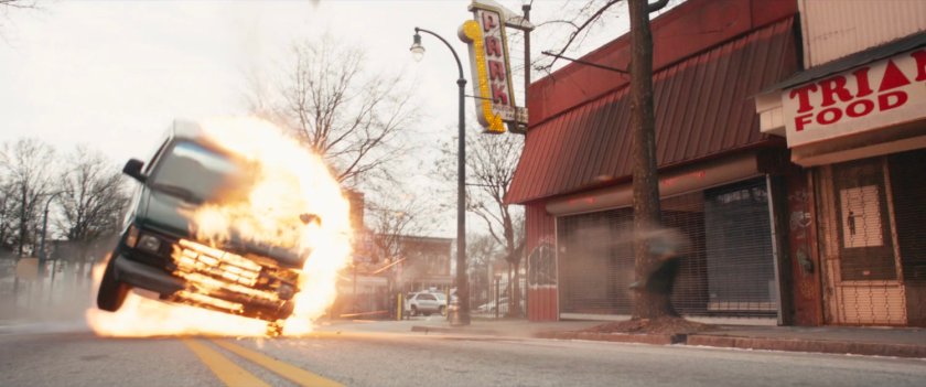 Van exploding and flipping on New York street.