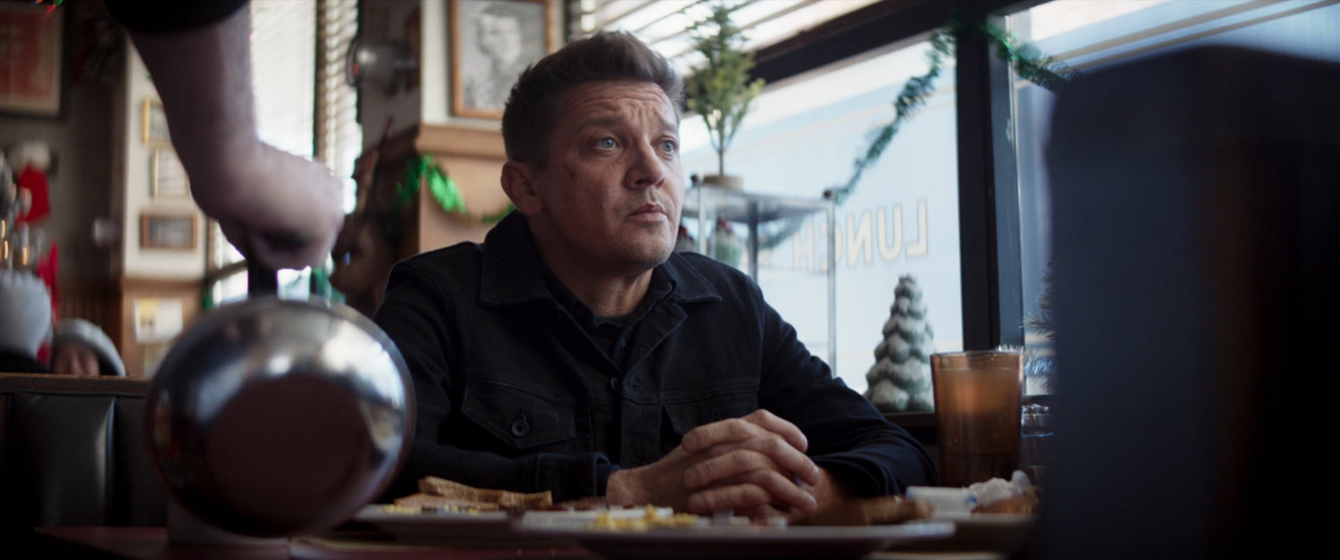 Clint in a diner.