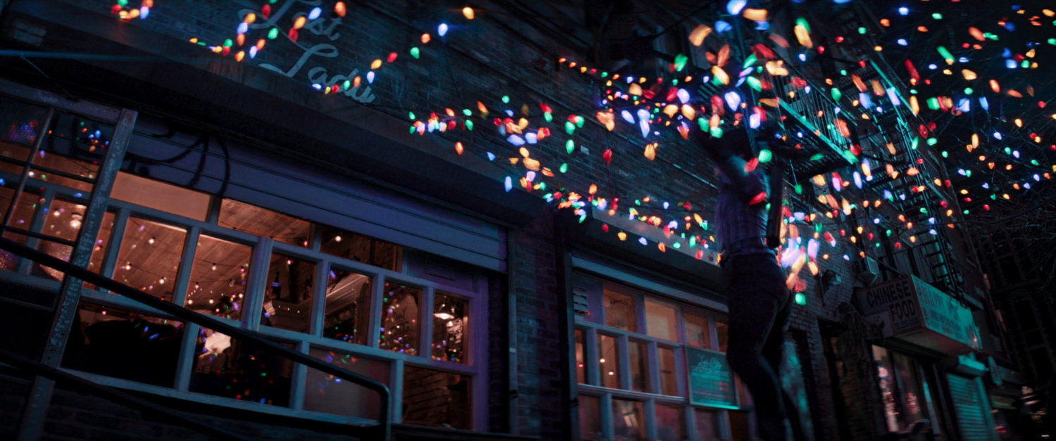 Kate falls into Christmas light decorations.