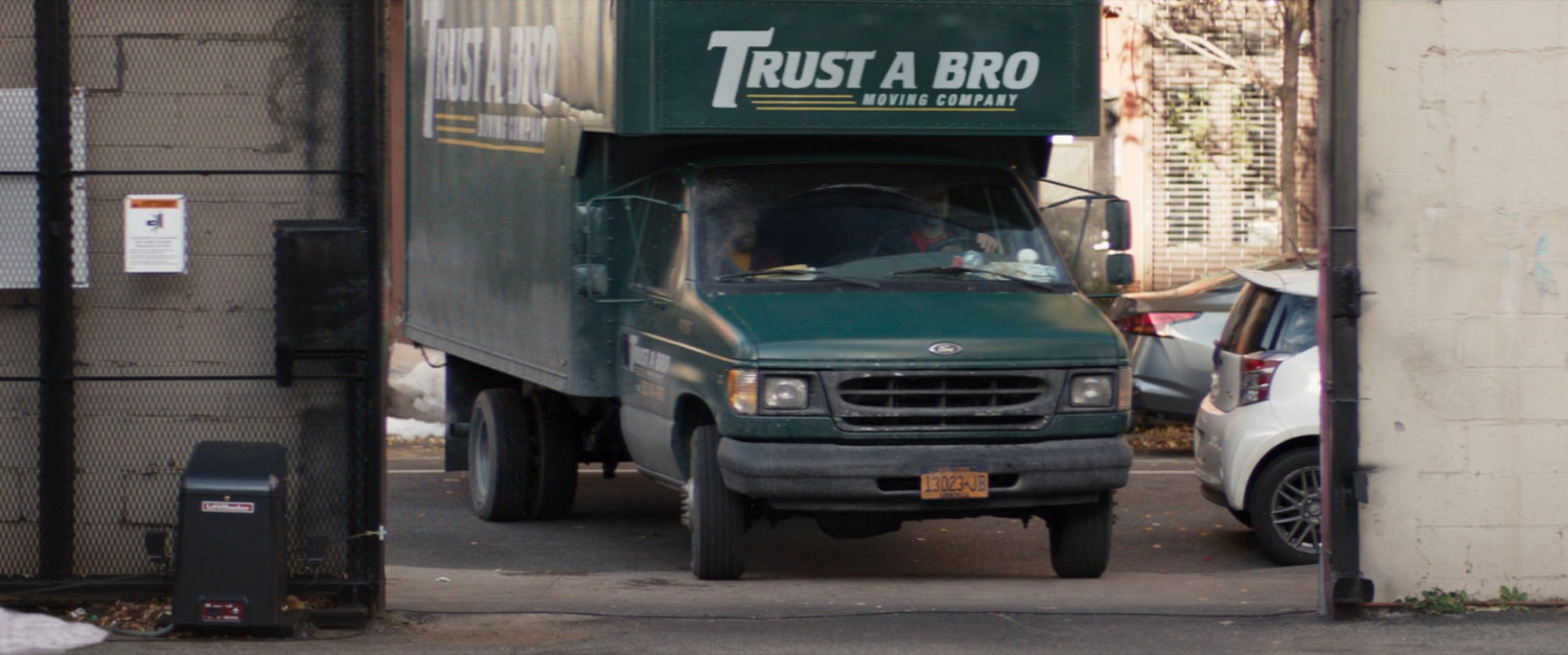 Trust-A-Bro van pulls into New York parking lot.