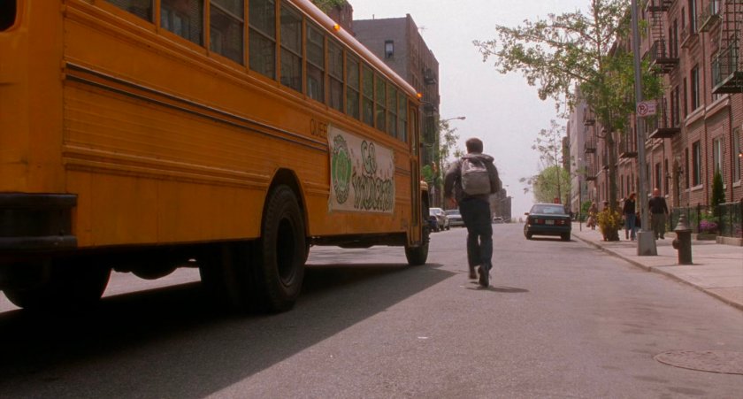 Peter Parker chases after school bus.