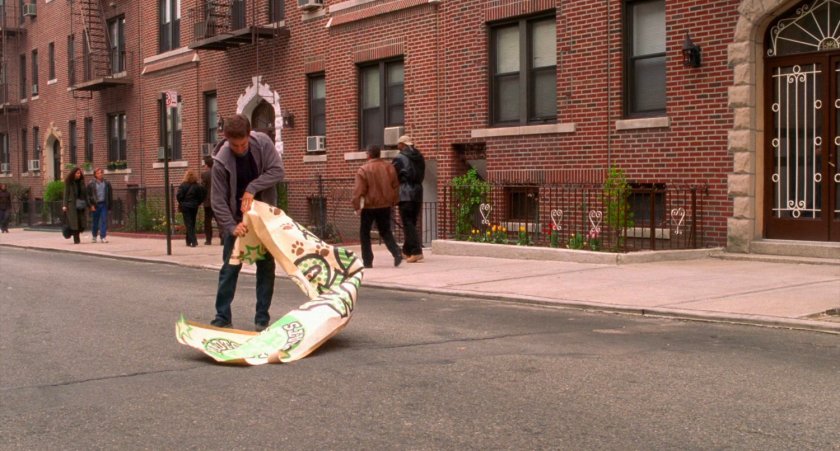 Peter Parker standing the street.