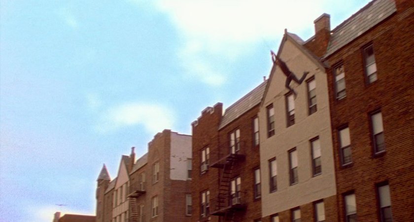 Peter Parker swinging off a building.