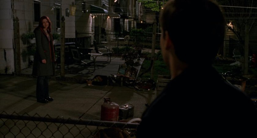 Back alley behind Peter Parker house at night.