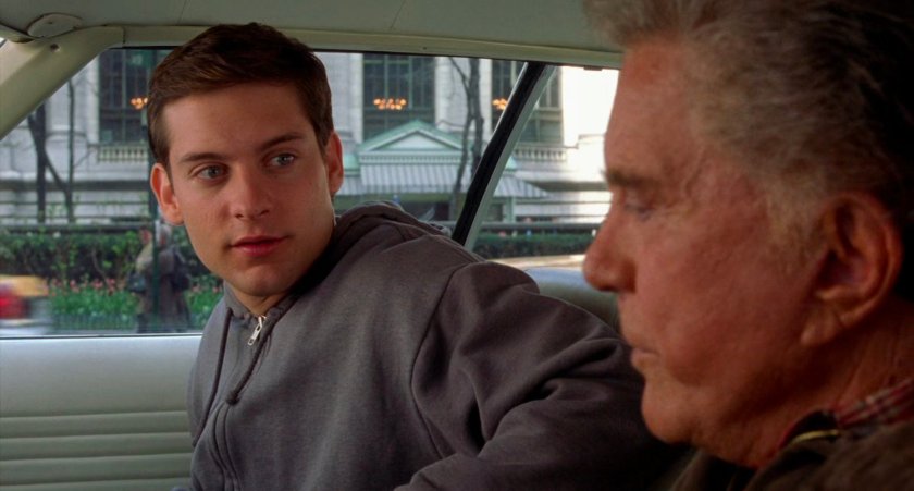 Peter Parker and Uncle Ben in car.