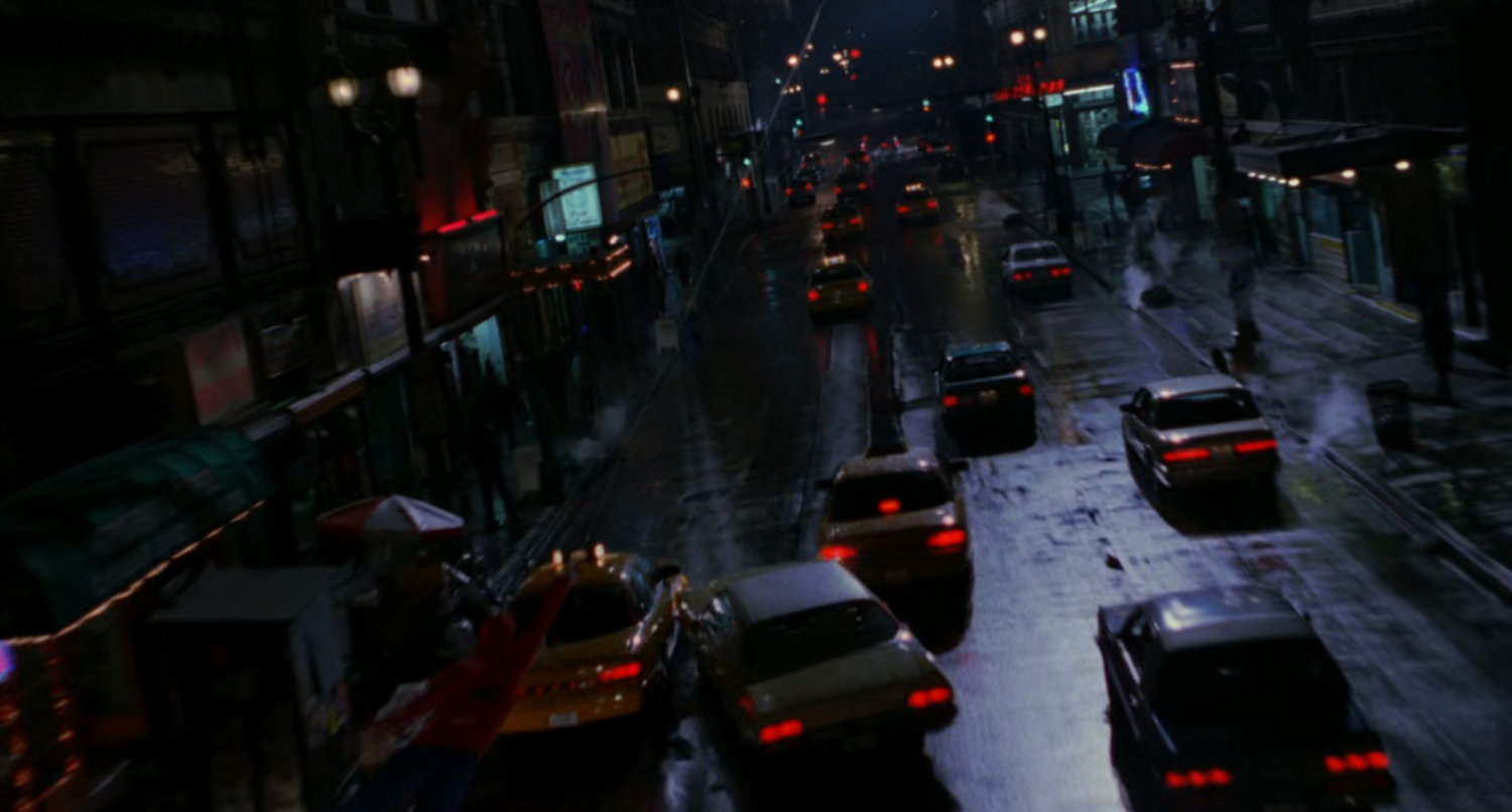 Night street car chase.