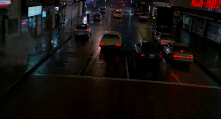 Night street car chase.