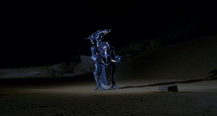 Robotic suit in desert.