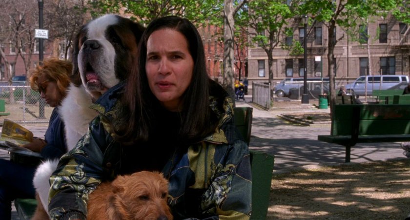 Woman and dogs at park being interviewed.