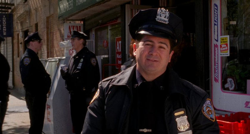 Police officer being interviewed.