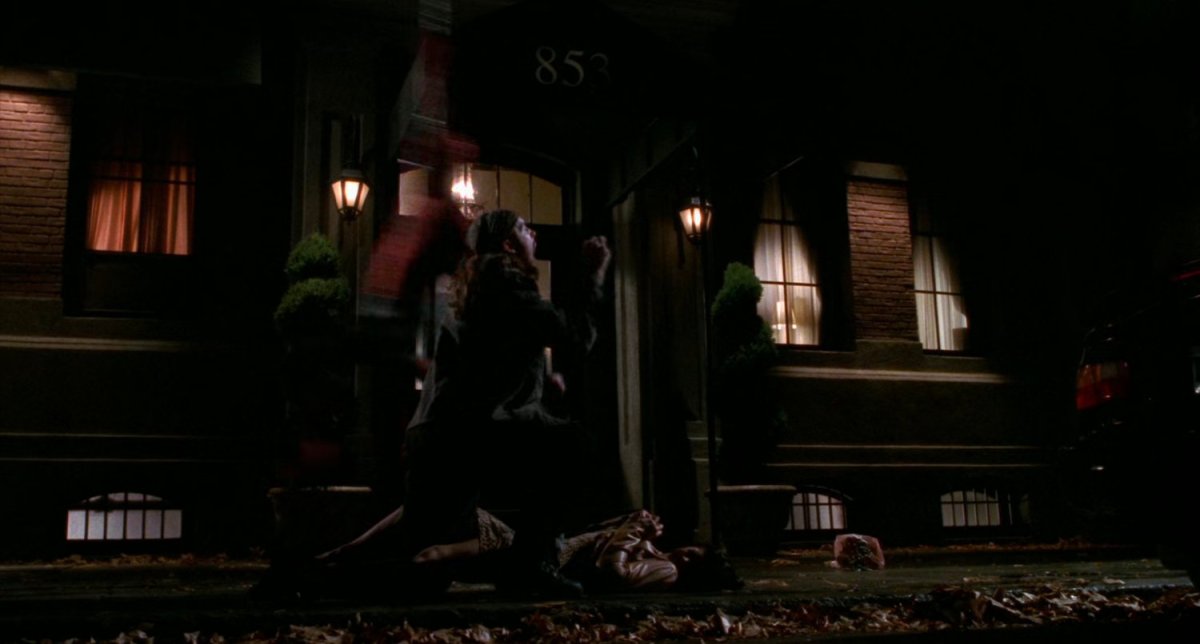 Mugger being captured by Spider-Man.