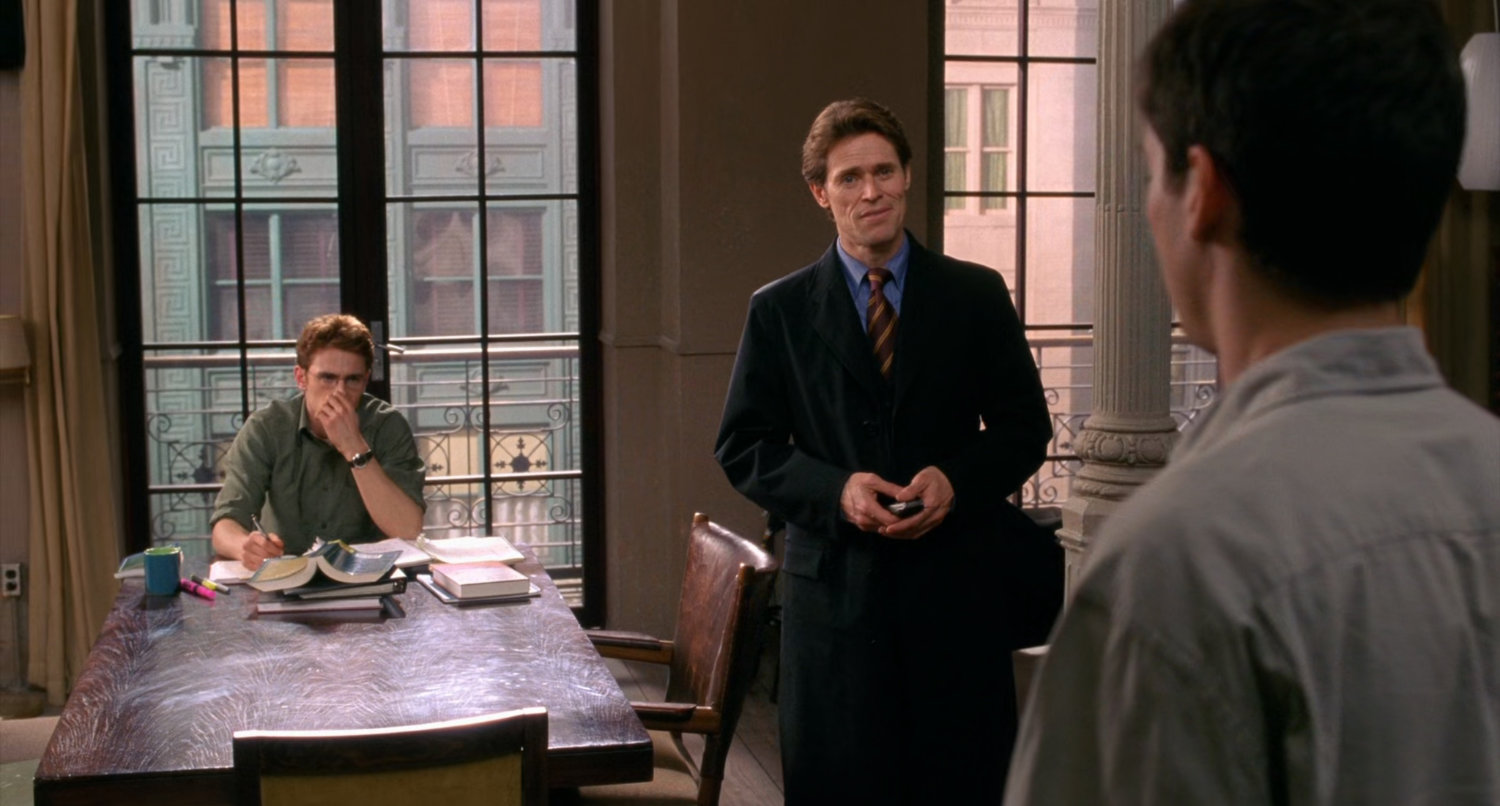 Harry and Norman Osborn inside apartment.
