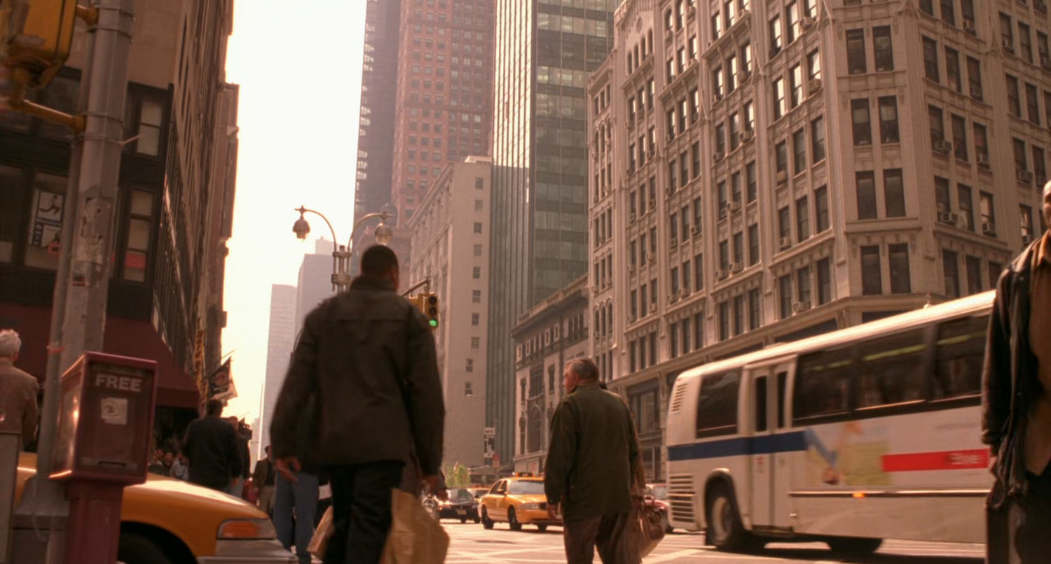 Spider-Man swings through New York intersection.