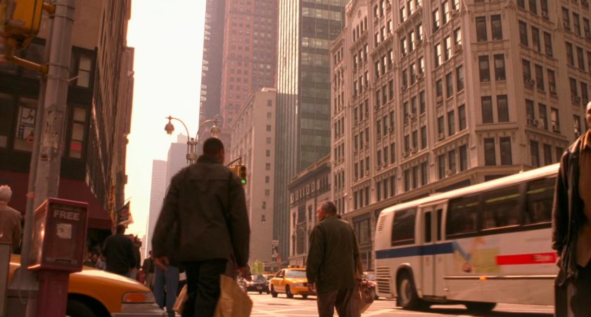 Spider-Man swings through New York intersection.