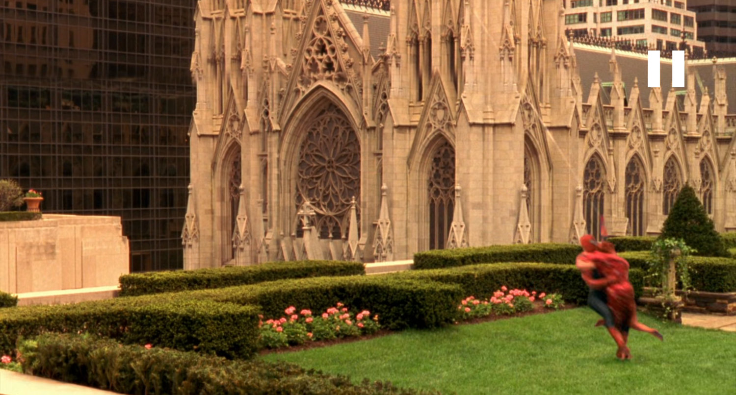 Spider-Man and Mary Jane on the Rockefeller rooftop gardens with St. Patrick's Cathedral.