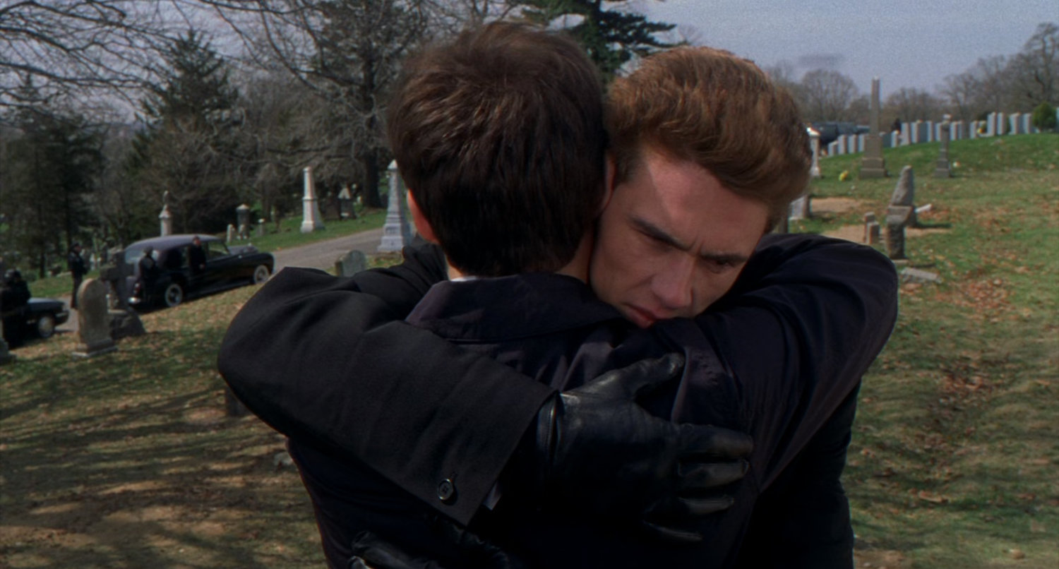 Harry Osborn hugs Peter Parker at Cemetery.