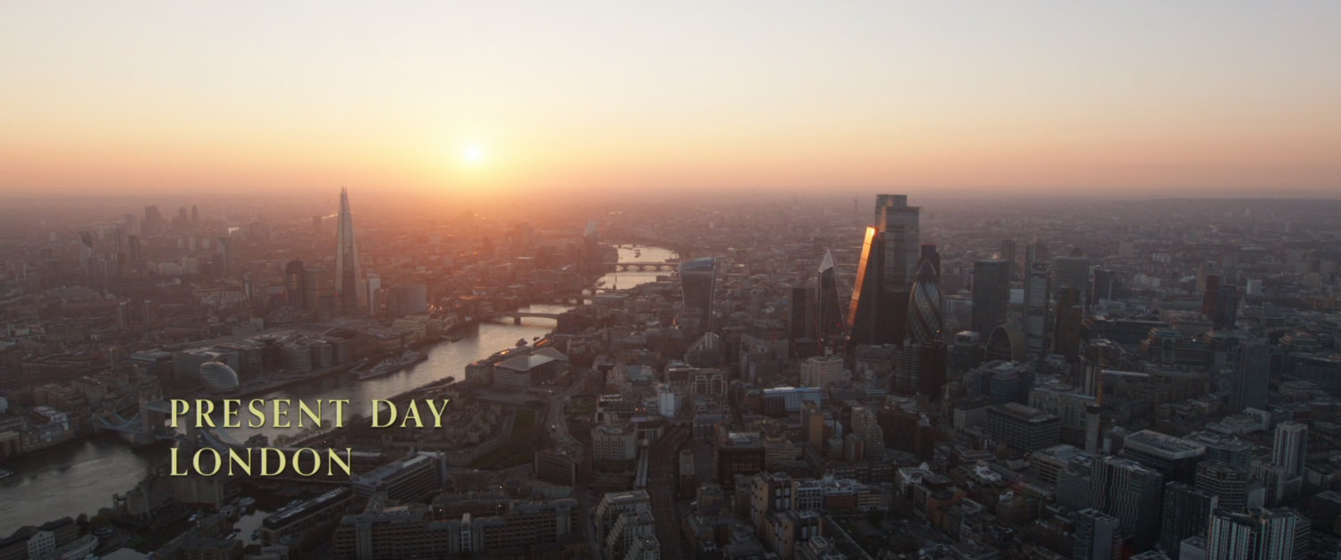 Aerial image of London at sunrise. Text: Present day London.