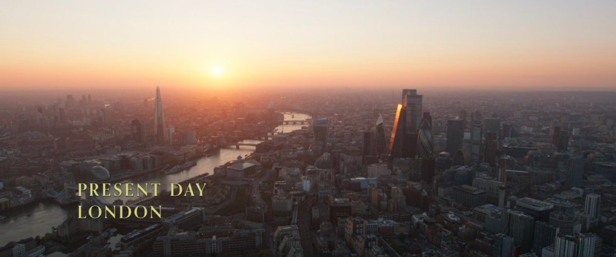 Aerial image of London at sunrise. Text: Present day London.