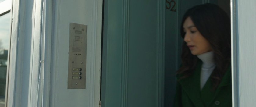 Sersi exiting building in London.