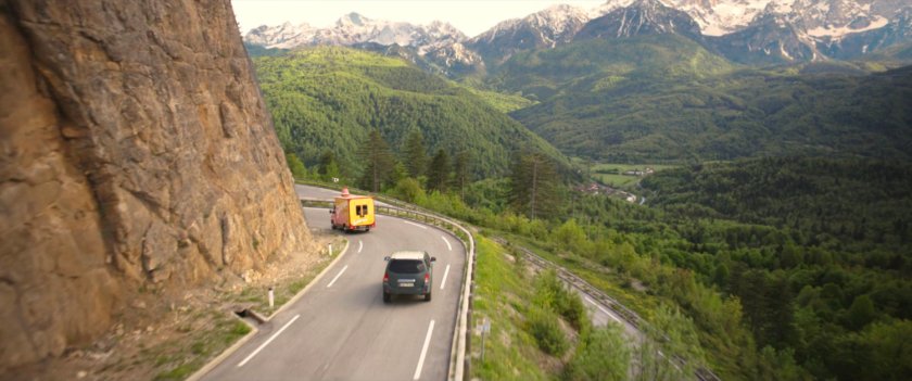 Cupcake truck being chased down alpine road in Germany.