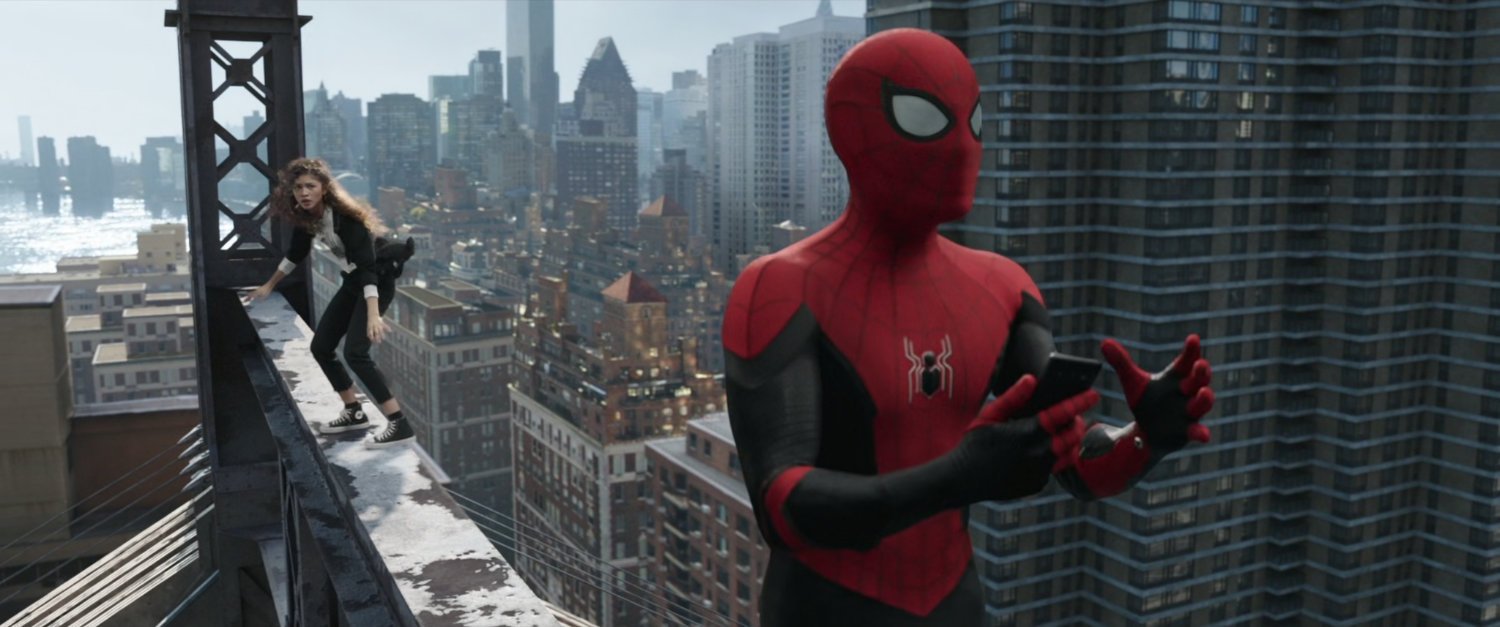 Spider-Man and MJ standing on the Queensboro Bridge with New York City in the background.