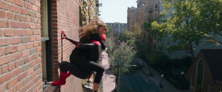 Spider-Man and MJ on the wall outside an apartment building on Queens.