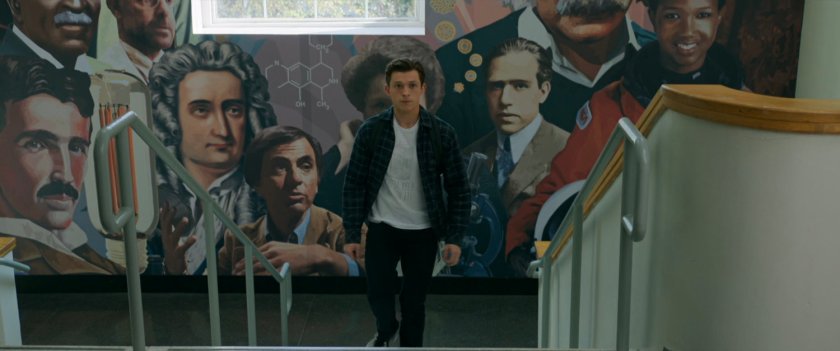 Peter Parker walking up stairs inside Midtown High.