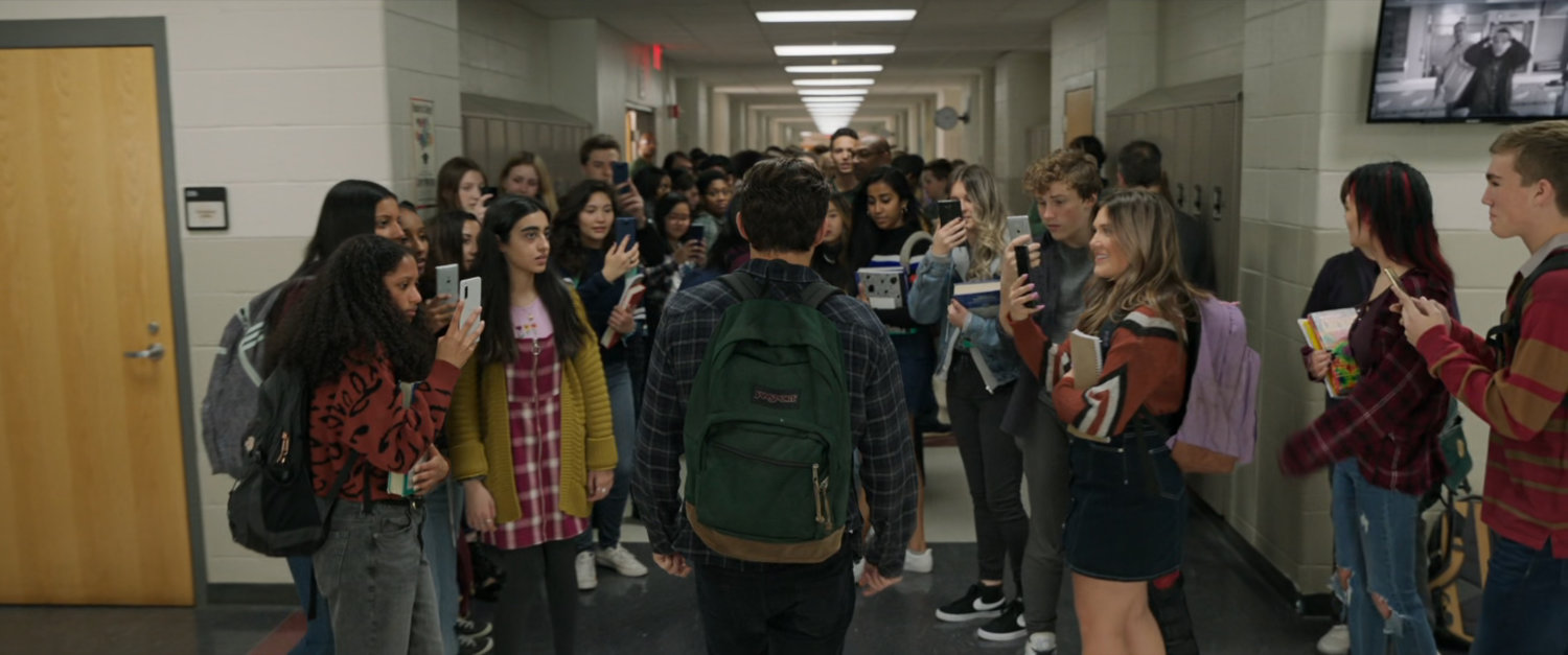 Students of Midtown High line the halls to stare at Peter Parker.